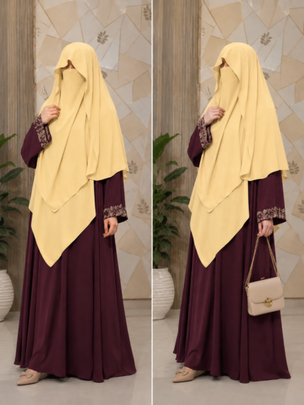 Yellow three layer chiffon hijab with matching niqab displayed on a mannequin, modest Islamic fashion.